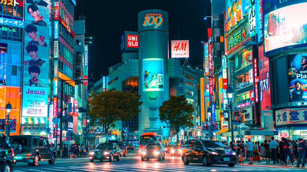 billboards in Japan at night in crossroad