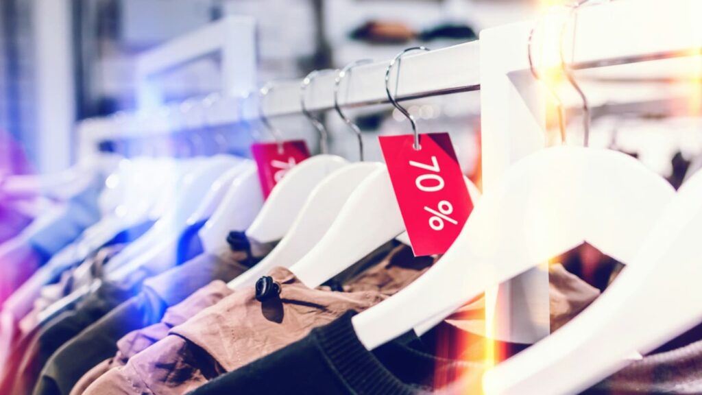 clothes hanger with sale tag in clothing stores