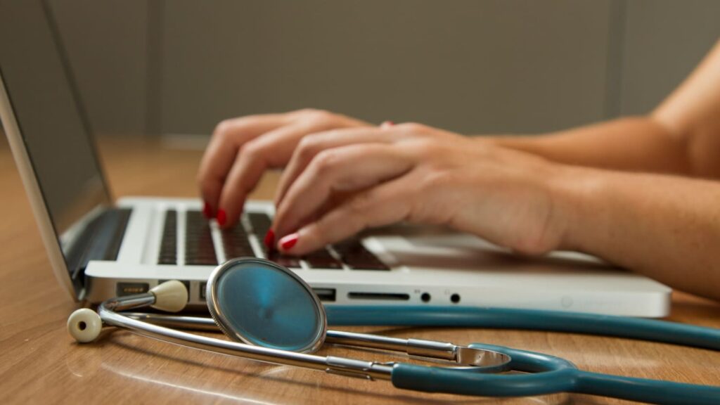 working on laptop about medico marketing