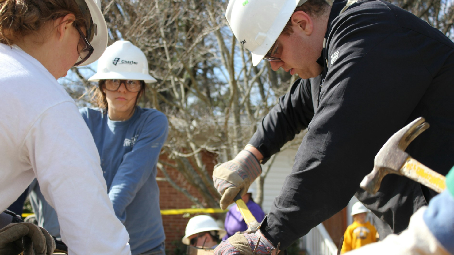 people fixing their home